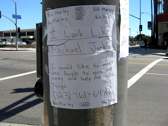 Mid-City Hand-Lettered Sign Bandit Strikes Again, Affirms Michael Jackson Appearance, Tags Marley, USC